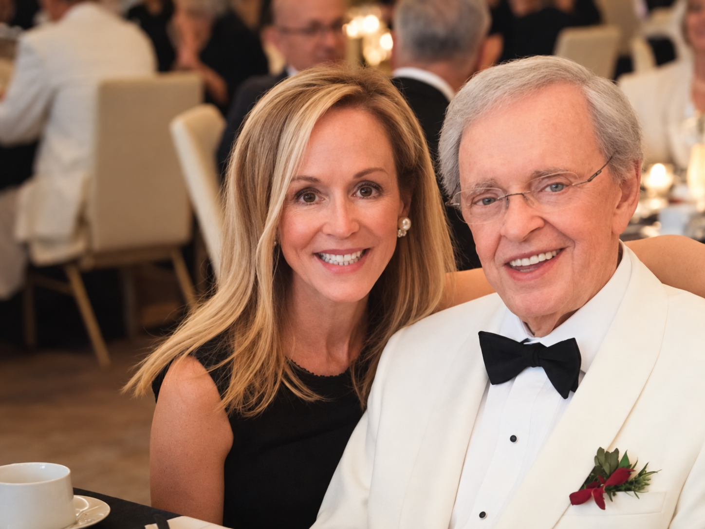Rebecca with her father, Dr. Charles Stanley, at a formal gathering